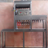 Sistema automatico di riempimento e tappatura per bottiglie di vetro a 6 teste per imbottigliare la birra